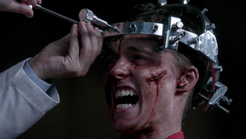 Crowley's torturer tightens the screws. Crowley's torturer tightens the screws.